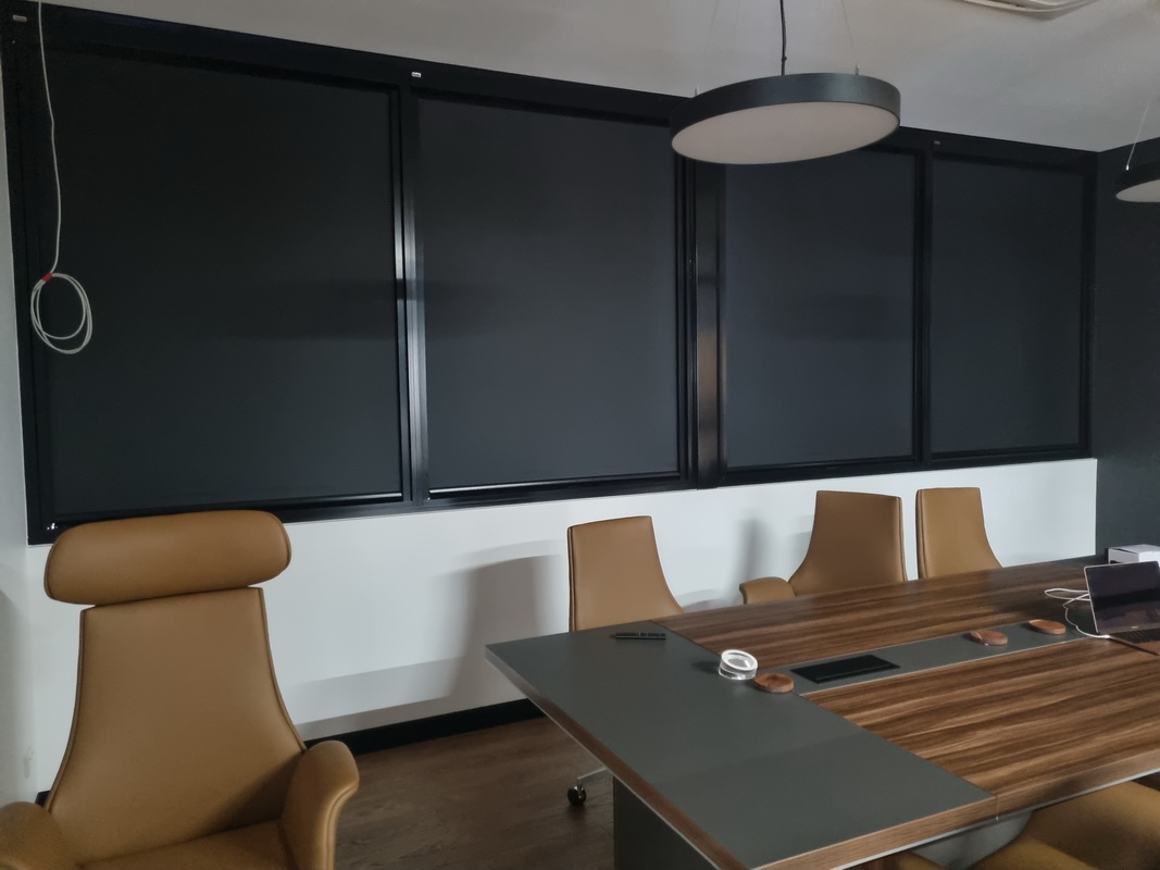 closed blackout blinds in office