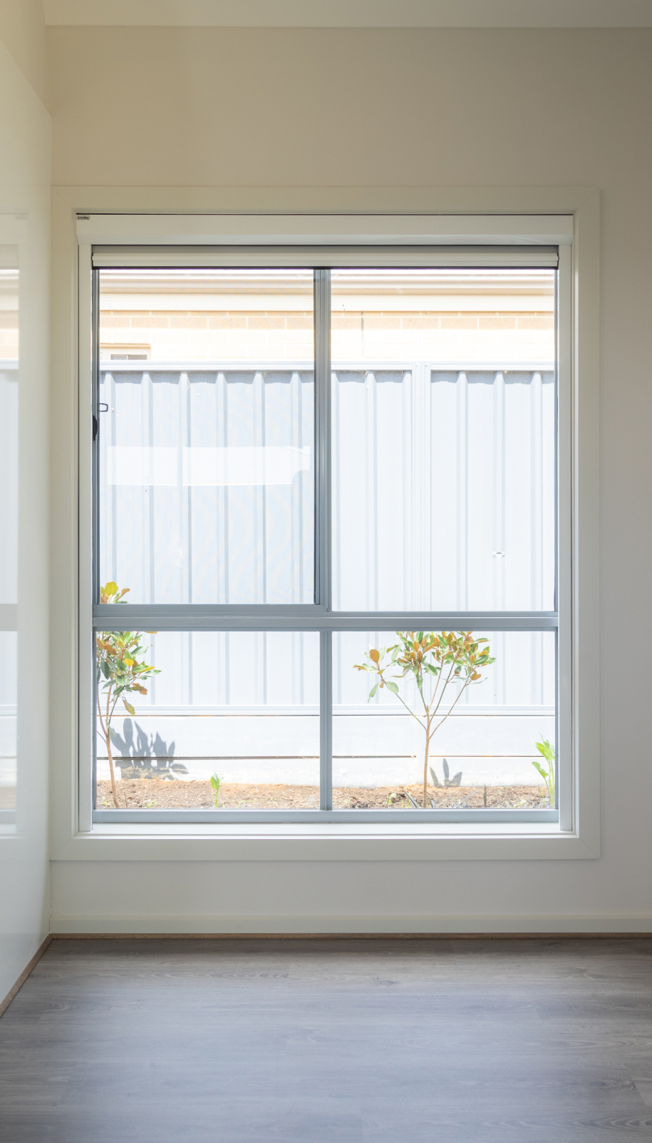 retractable window blinds in house