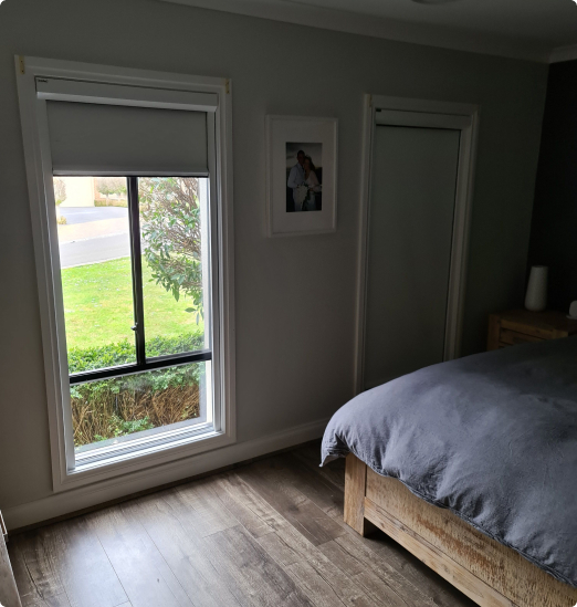 retractable window blinds in bedroom