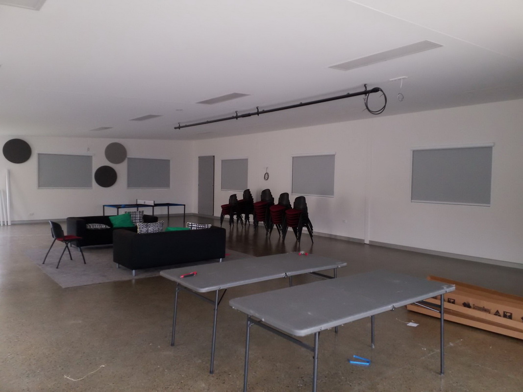 closed retractable blinds in office space