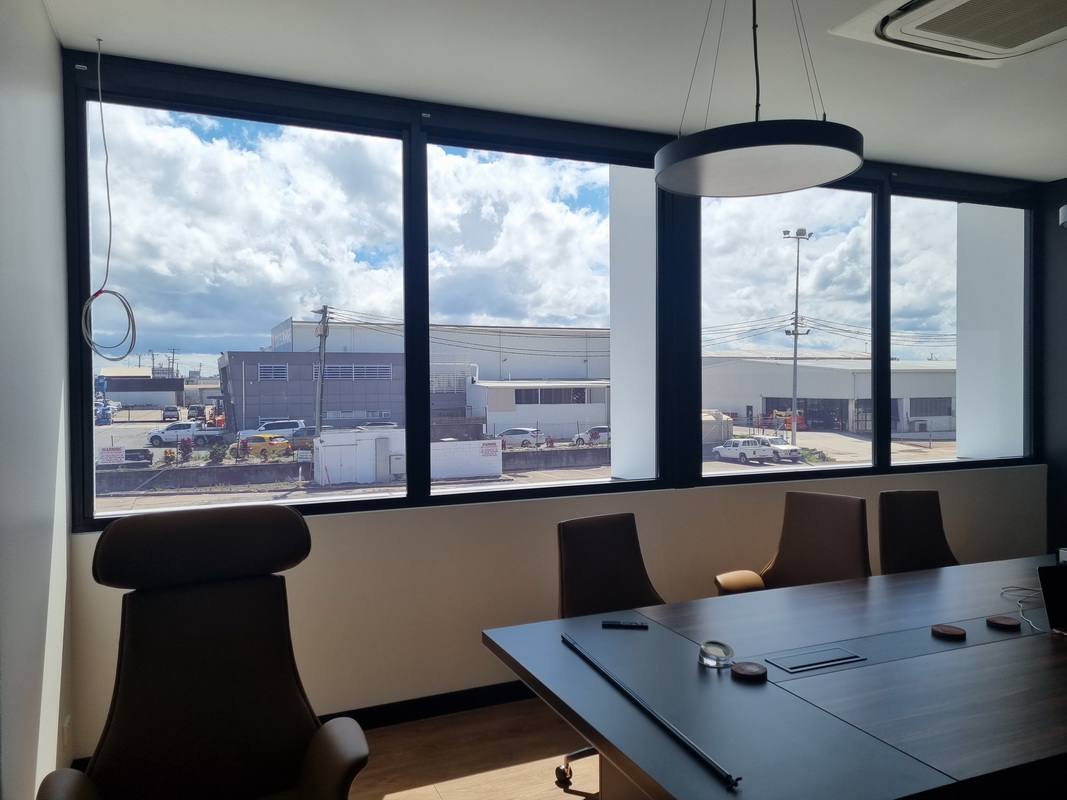 open retractable blinds in office space