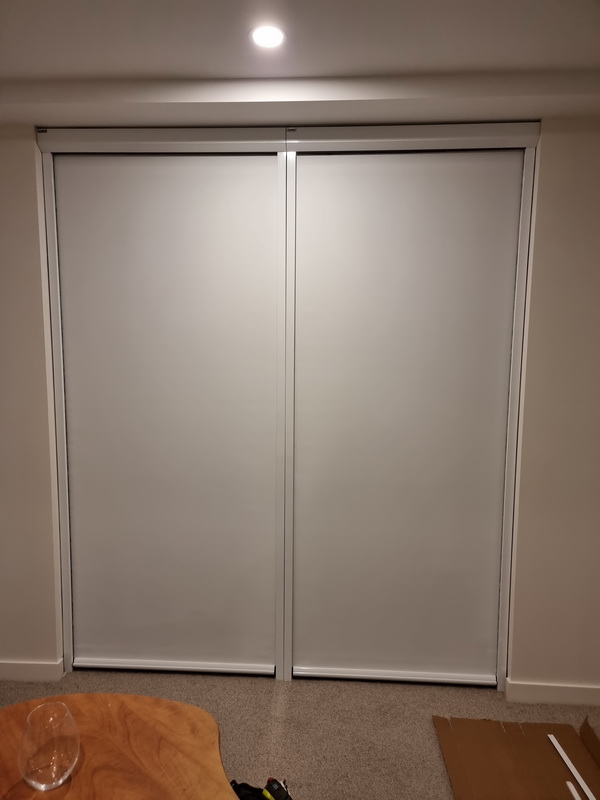 closed retractable blinds on doors