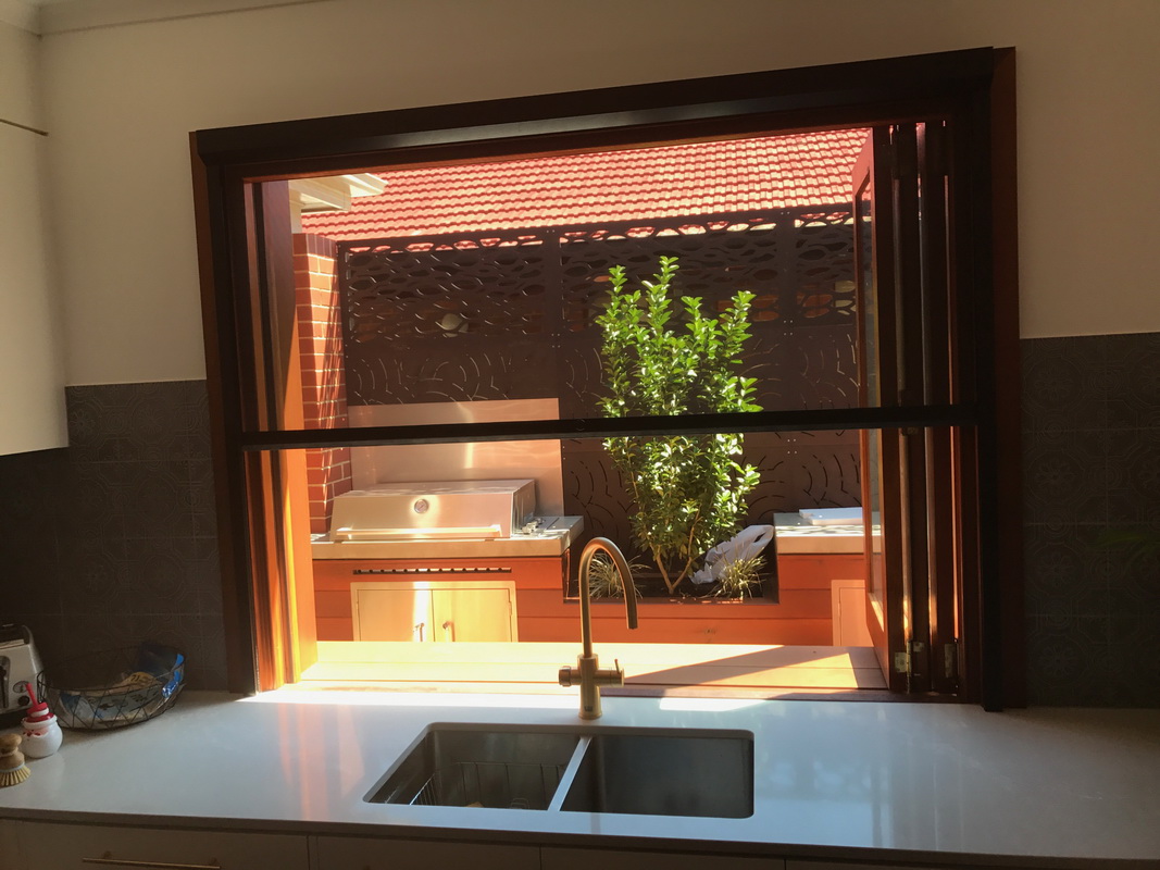 retractable fly screen on kitchen window