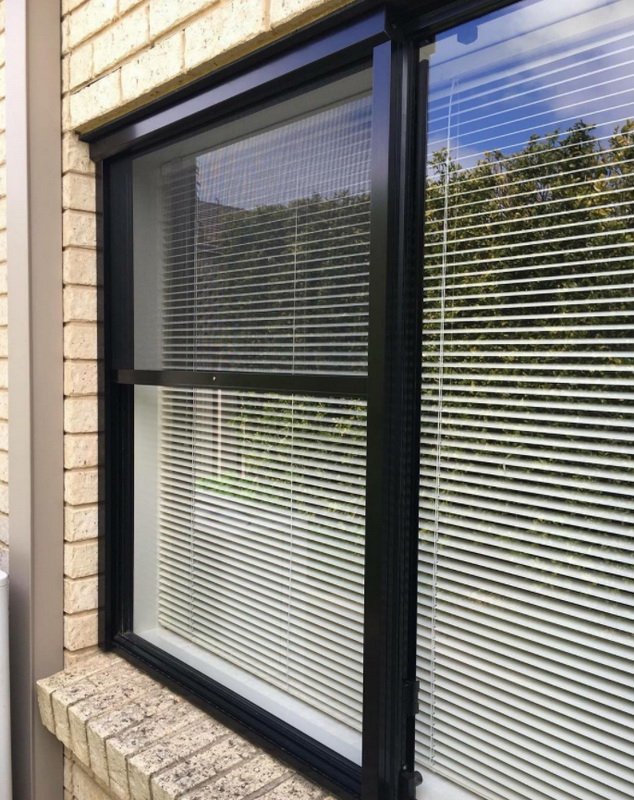 retractable fly screen on living room window