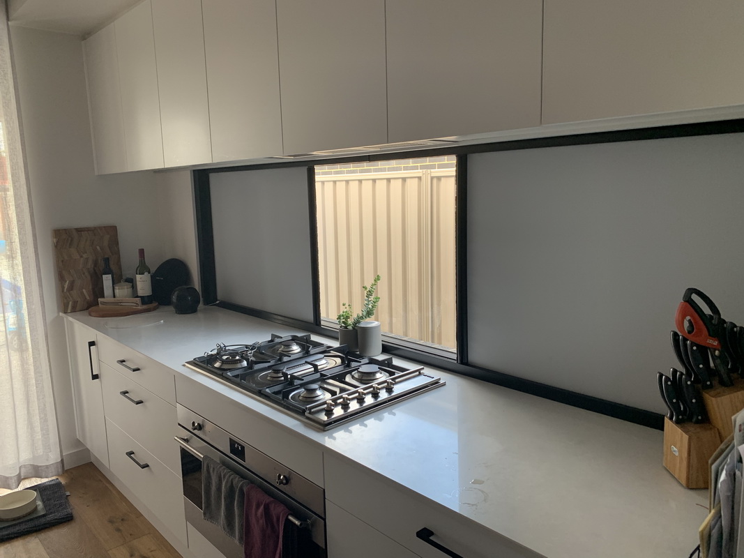 closed retractable blinds in kitchen