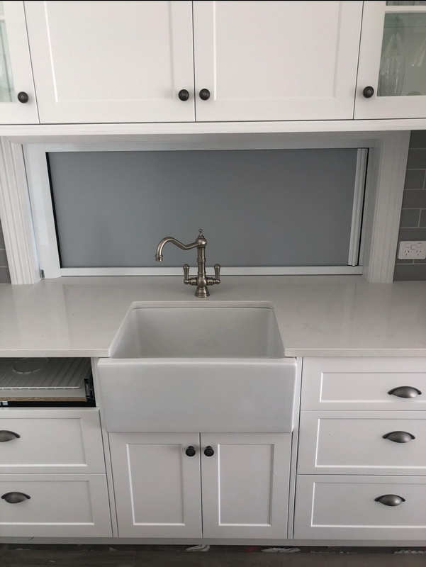 closed retractable blinds in kitchen