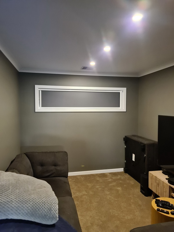 closed retractable blinds in theatre room