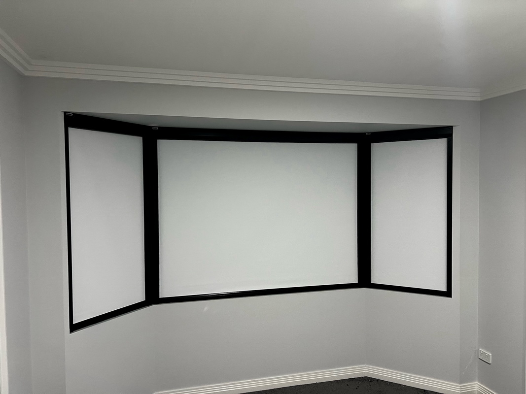 closed retractable window blinds in bedroom