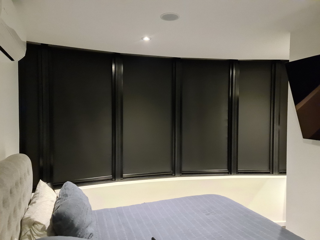 closed retractable window blinds in bedroom