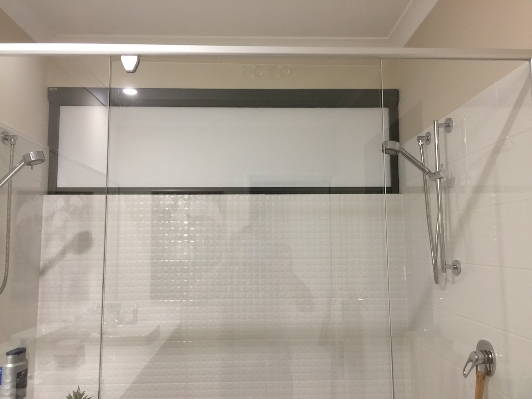 closed retractable blind in bathroom