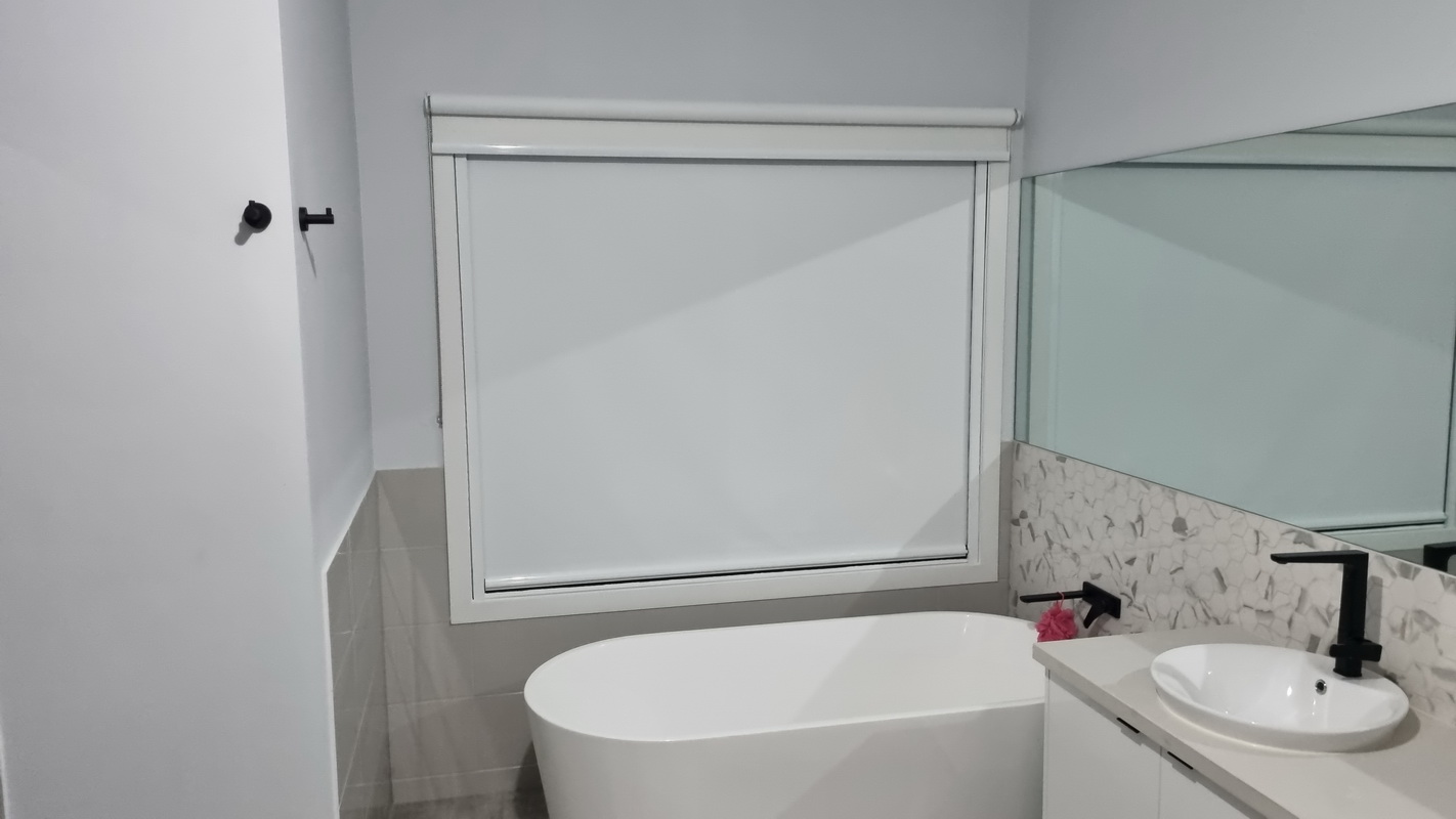 closed retractable blind in bathroom