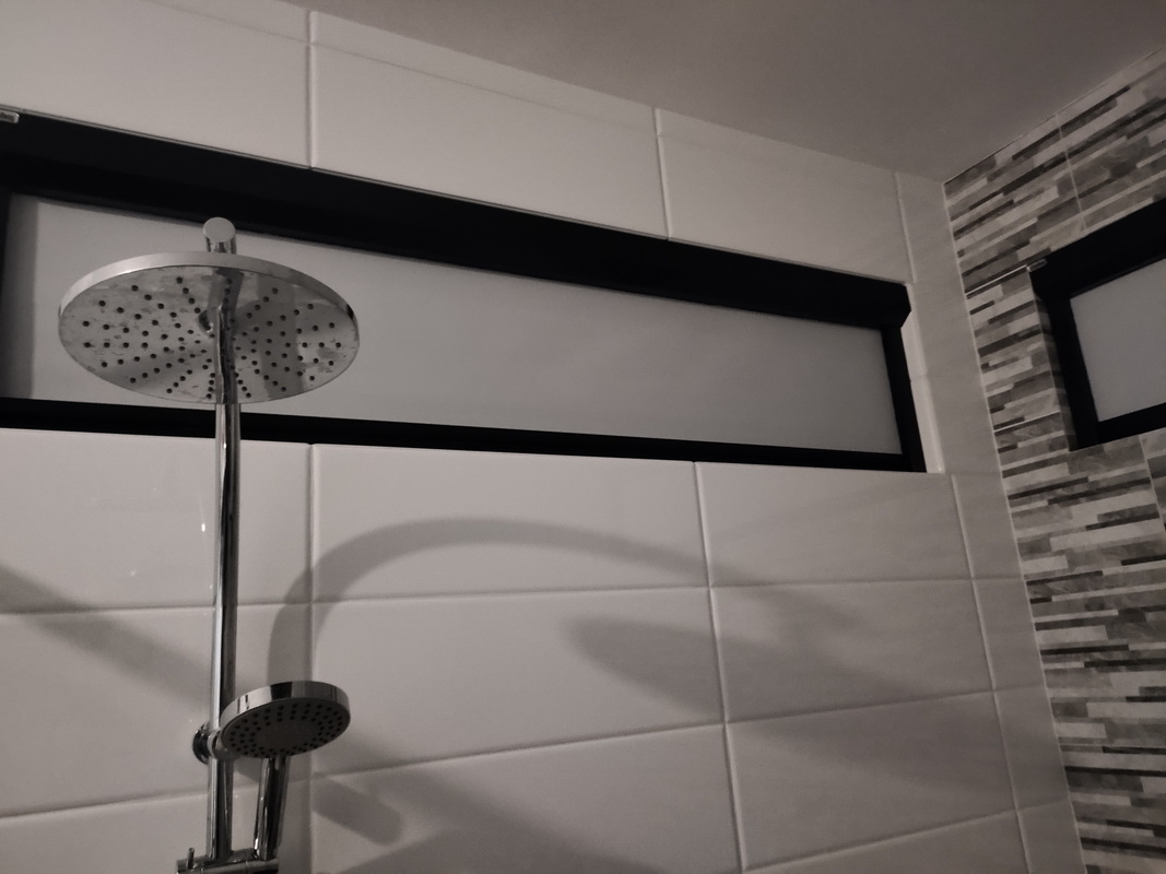 closed retractable blind in bathroom