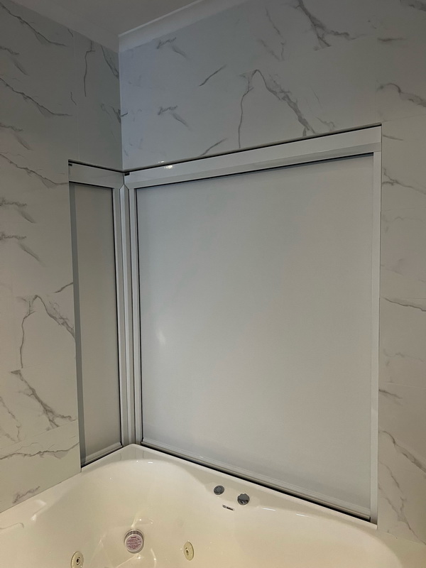 closed retractable blinds in bathroom