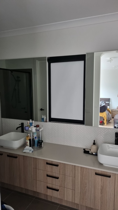 closed retractable blind in bathroom