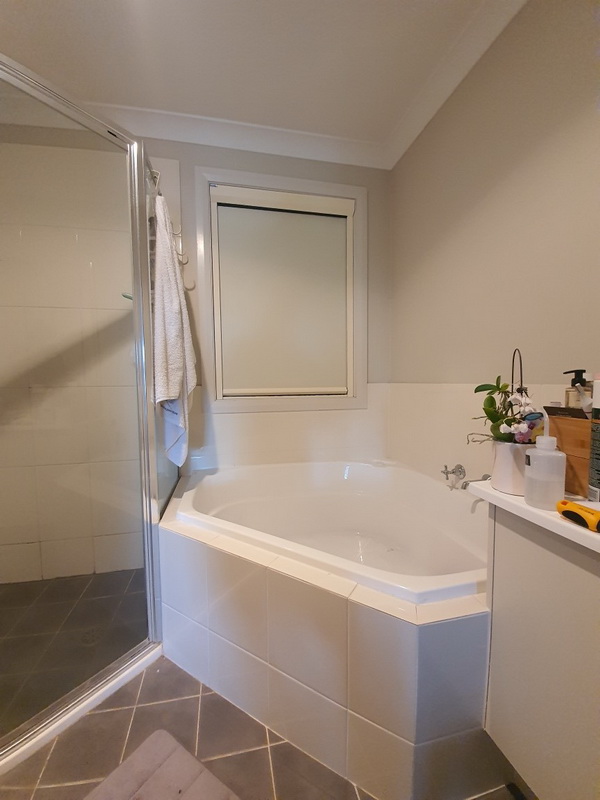 closed retractable blind in bathroom
