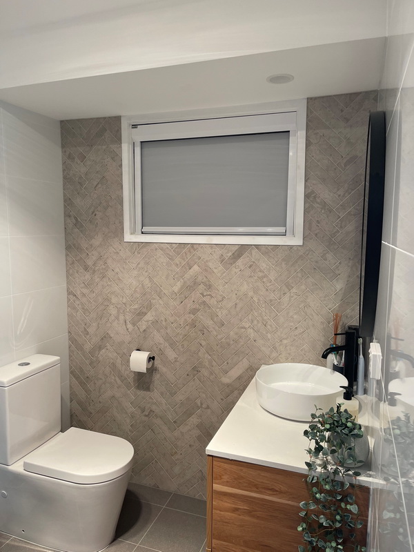 closed retractable blind in bathroom