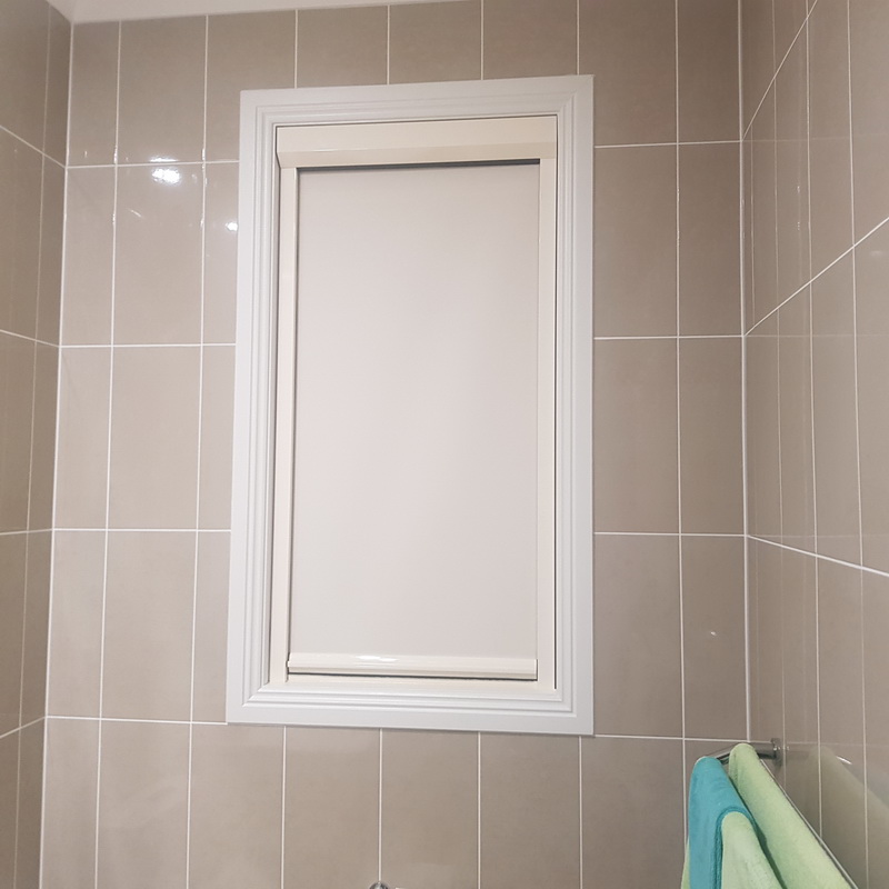 closed retractable blind in bathroom