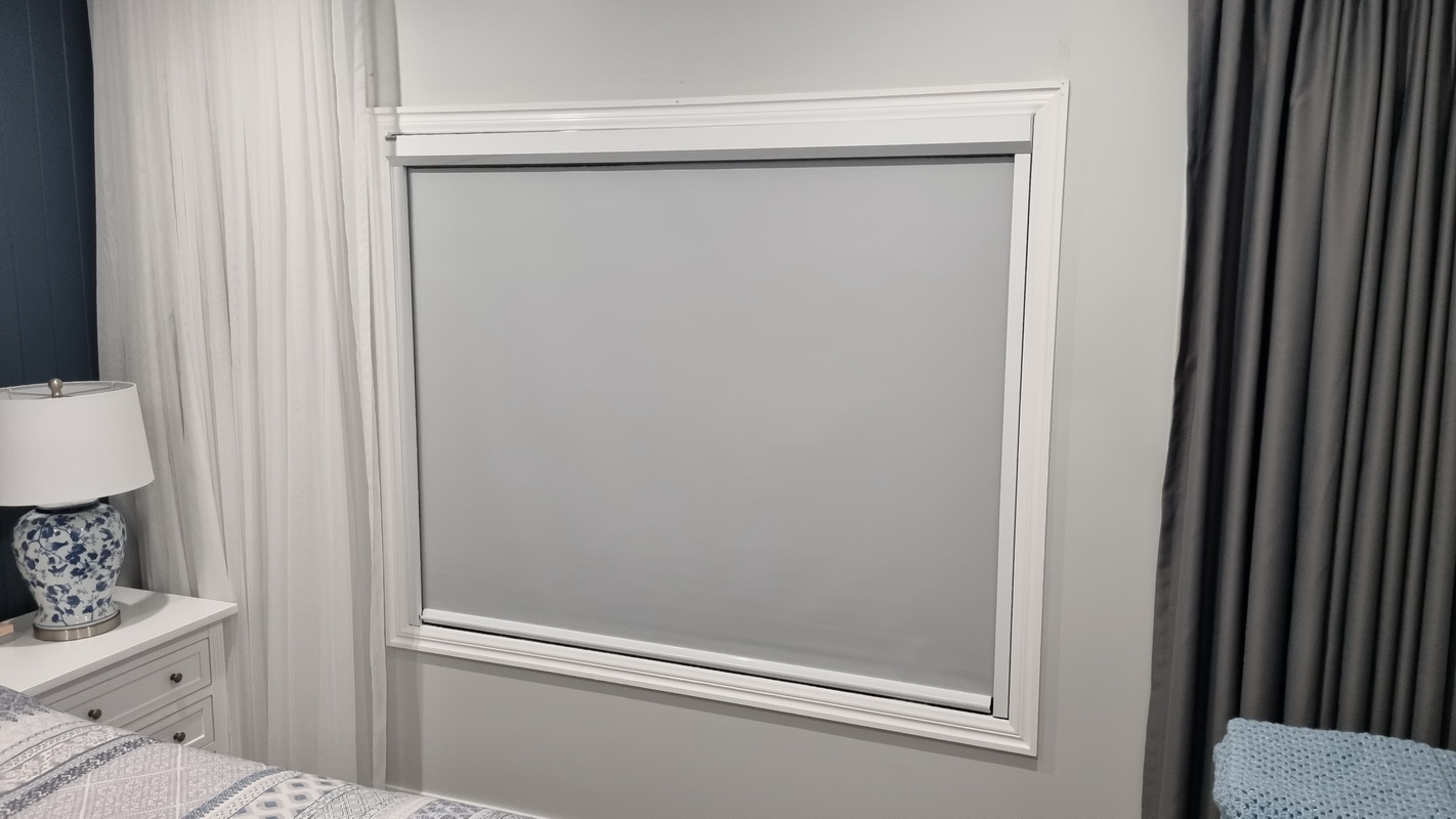 closed retractable blind in bedroom