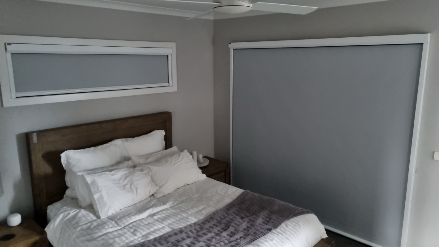 closed retractable blinds in bedroom