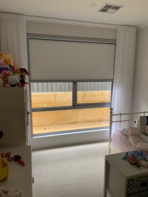 nursery with open retractable blinds