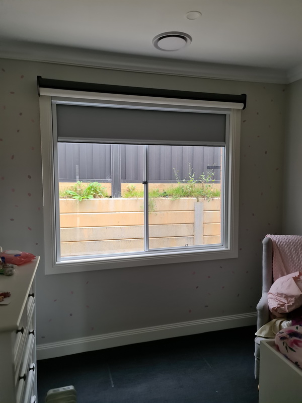 nursery with open retractable blinds