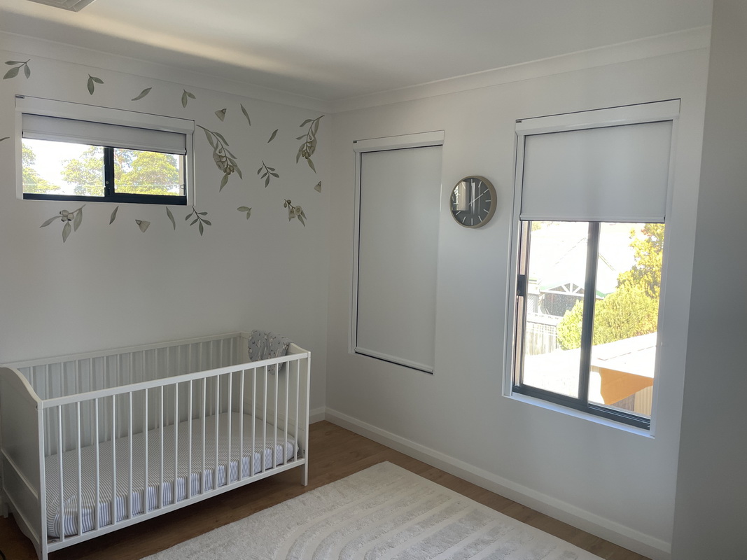 nursery with open retractable blinds