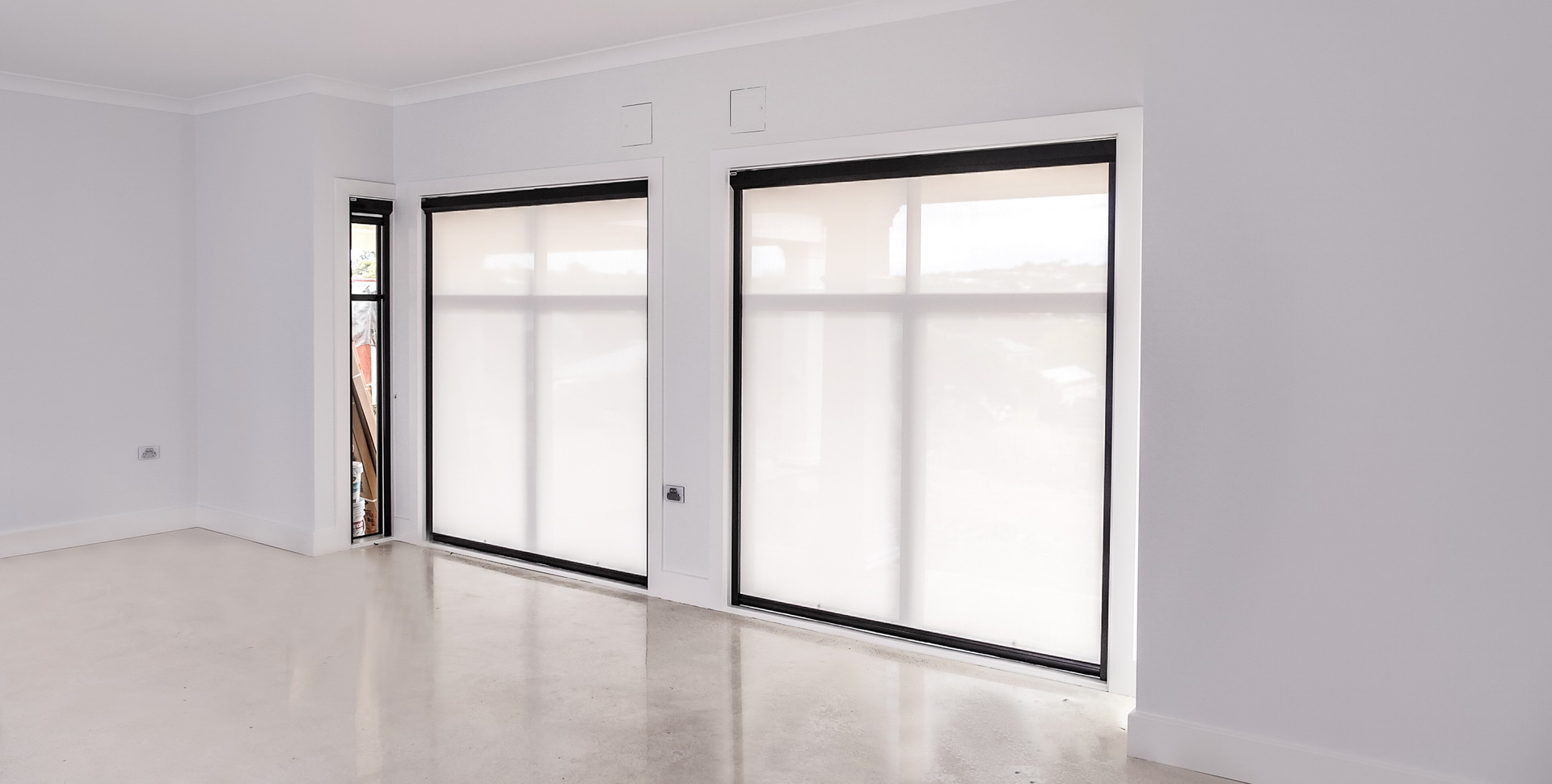 closed retractable sheer screens in residential house