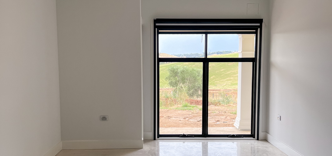 open retractable sheer screens in residential house