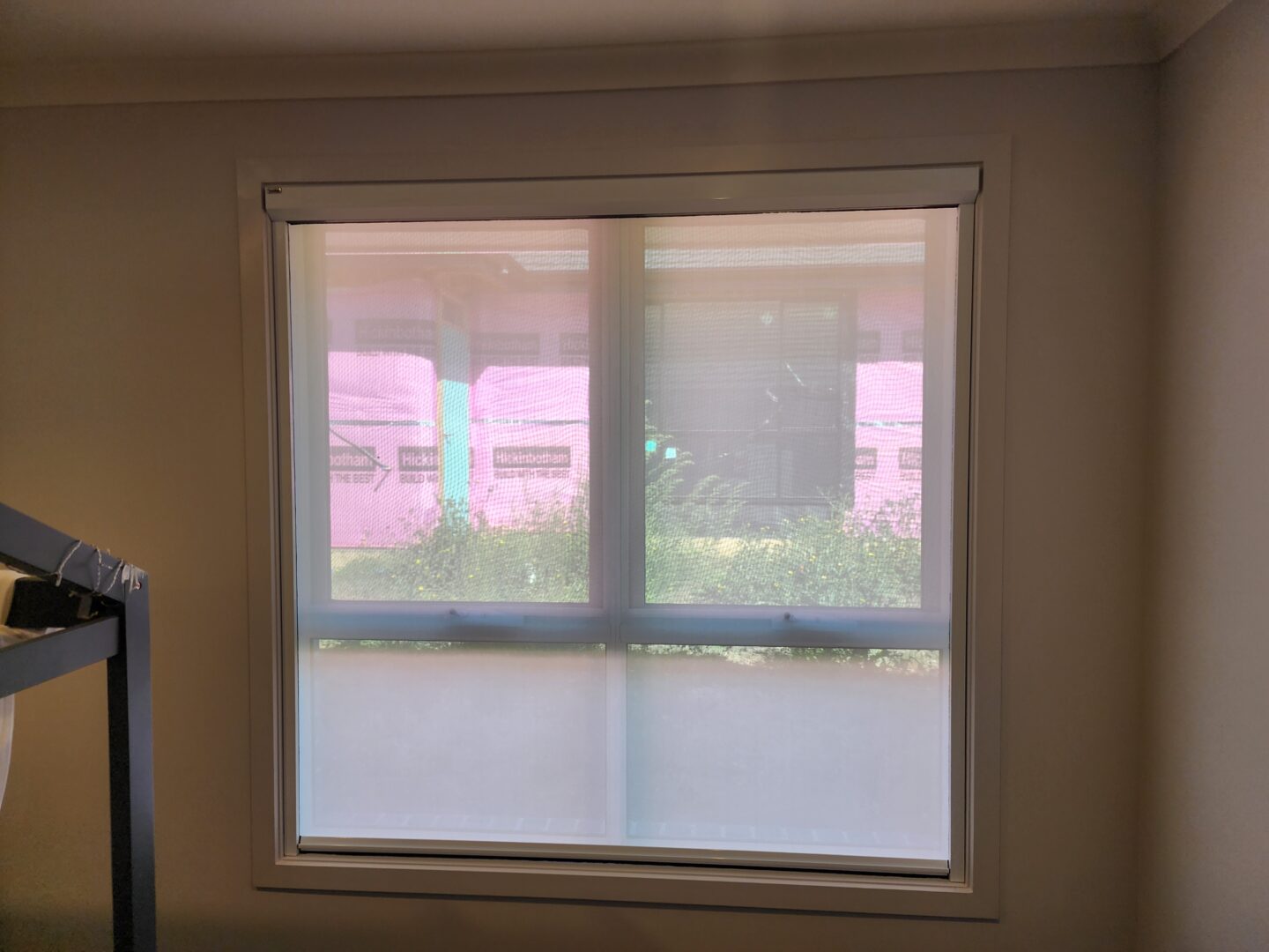 Closed white retractable ScreenAway blind
